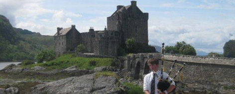 Piper at Eilean Donan Castle